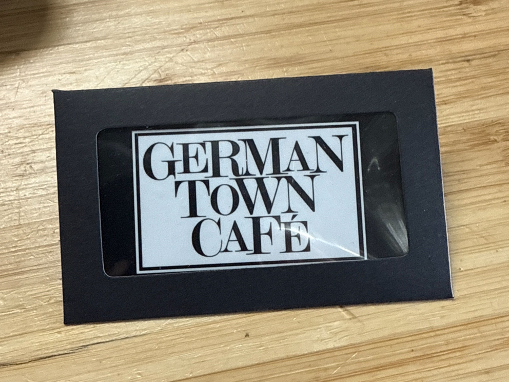 Germantown Cafe physical gift card in a branded sleeve