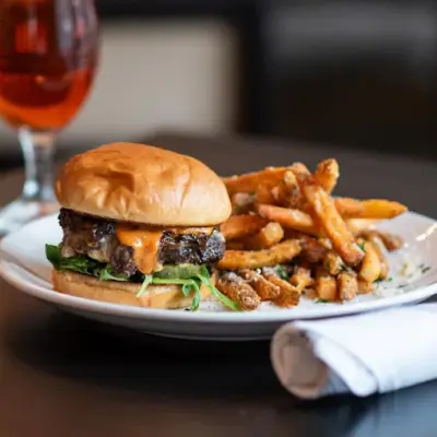 Signature burger plated for catering