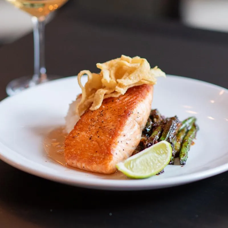 Crispy salmon entrée that pairs with market salad at Germantown Cafe